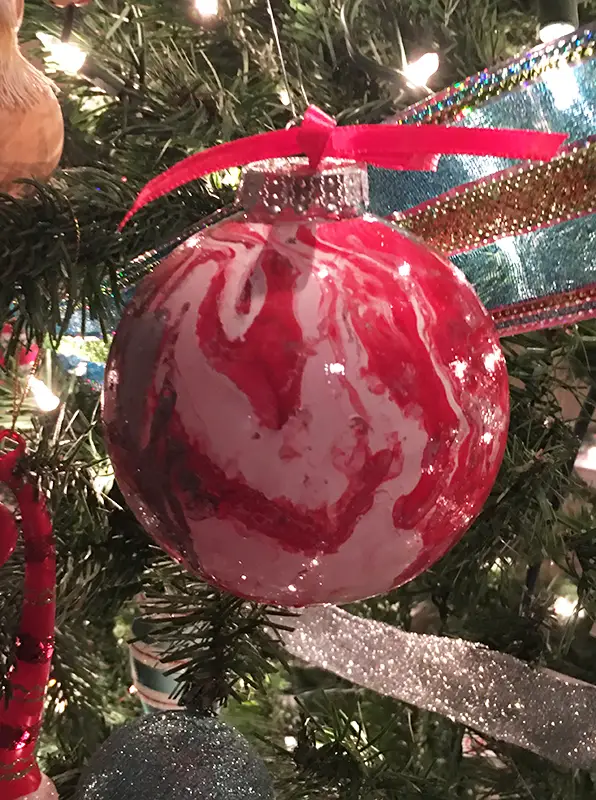 DIY Hydro dipped ornaments hanging on Christmas tree