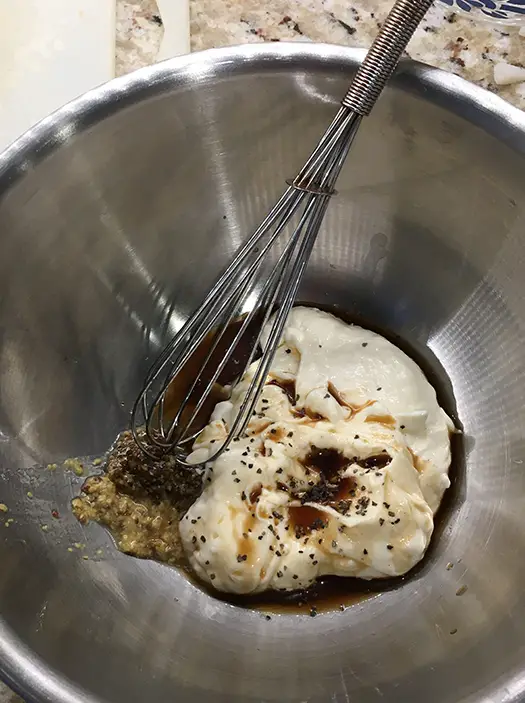 first ingredients in micing bowl for homemade crab cakes