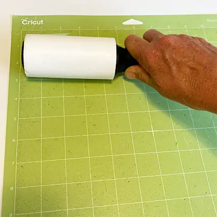 how to clean cricut cutting mats - use a lint roller