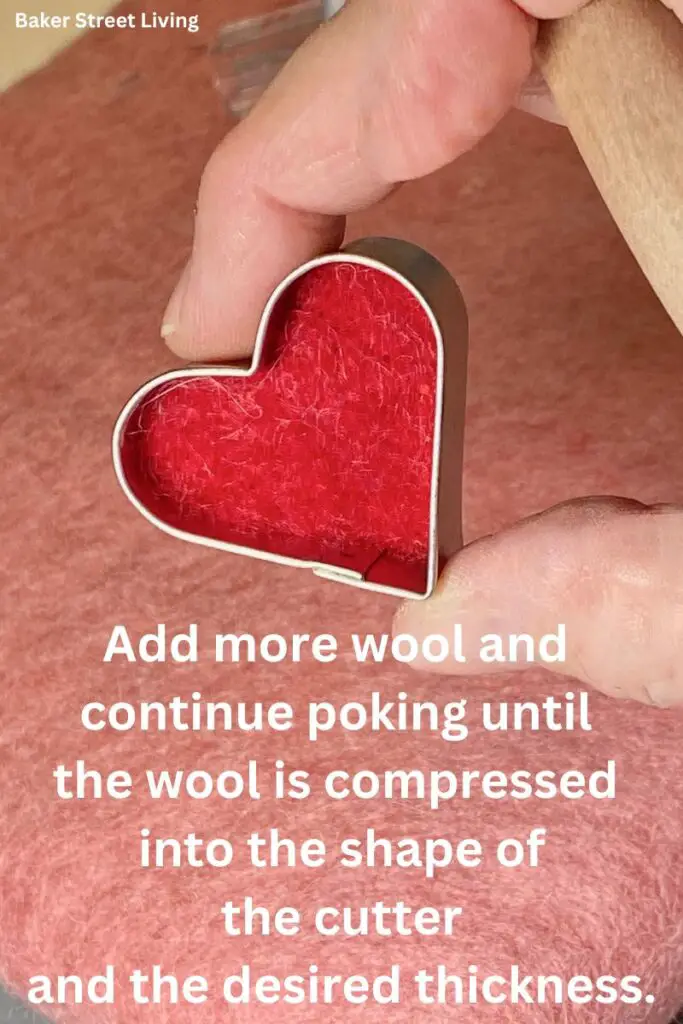 how to needle felt - make a heart shape with a cookie cutter