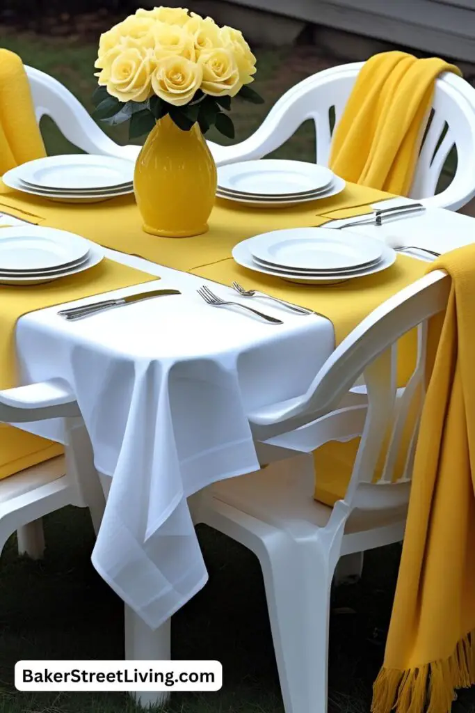 yellow and white plastic patio table set for dinner